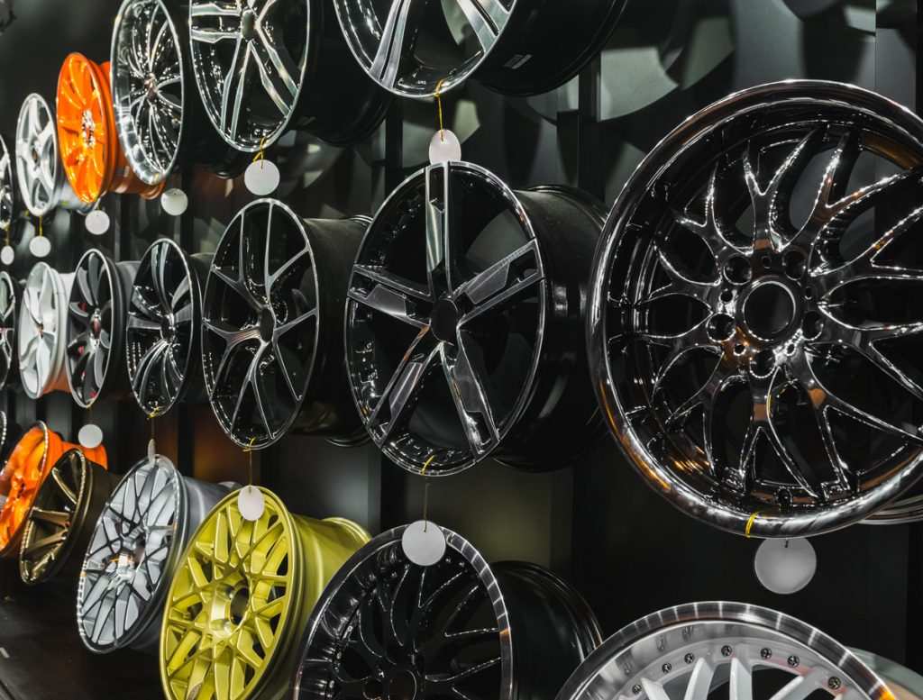 Wall of alloy coated refurbished wheels in fareham